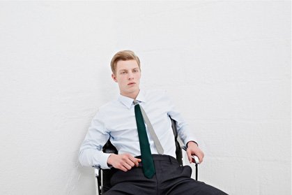 light blue business shirt with green tie